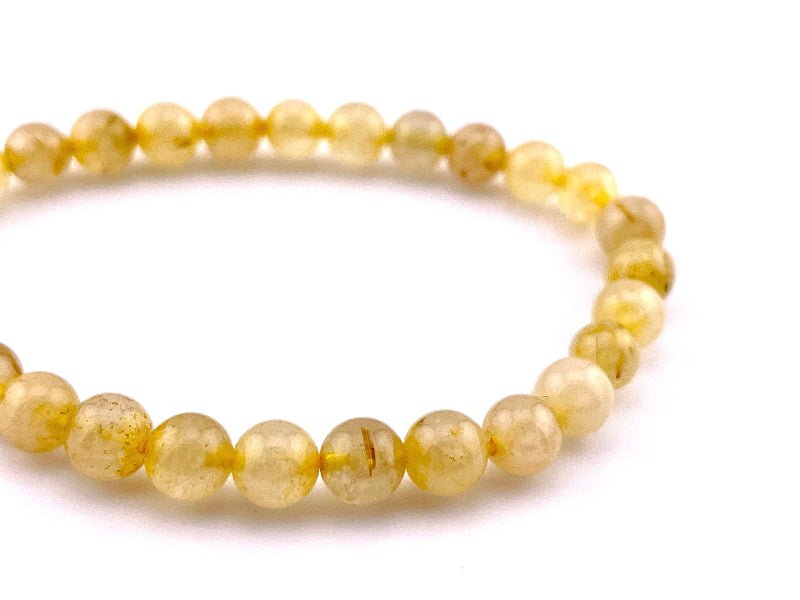 Golden Rutilquarz Armband mit 6mm großen Perlen auf elastischem Band