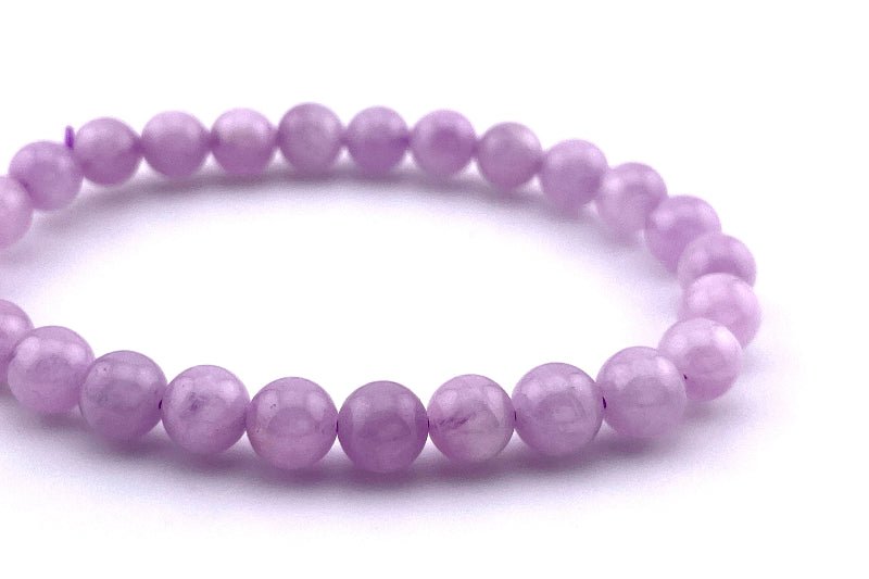 Kunzit Armband mit 6mm großen Perlen auf elastischem Band