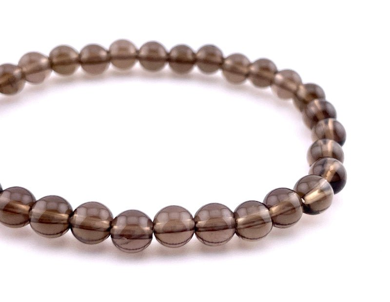 Rauchquarz Armband mit 6mm großen perlen auf elastischem Band