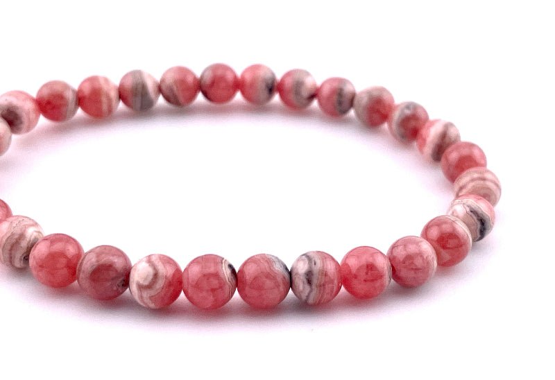 Rhodochrosit Armband mit 6mm großen Perlen auf elastischem Band, sehr selten mit top qualität