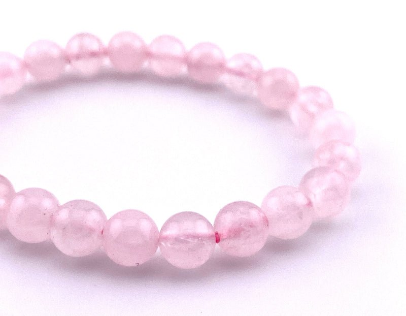 Rosenquarz Armband für liebe und Freundschaft mit 8mm großen Perlen auf elastischem Band