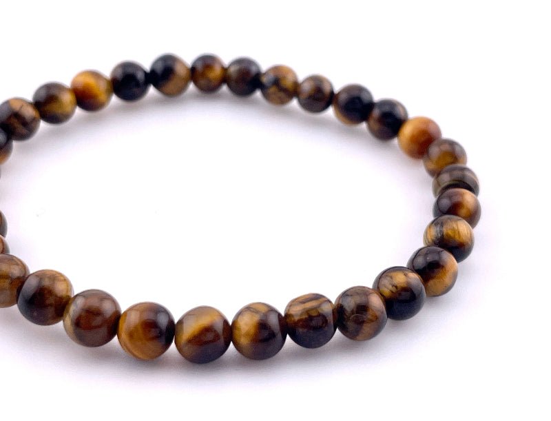 Tigerauge Armband mit 6mm großen Perlen auf elastischem Band